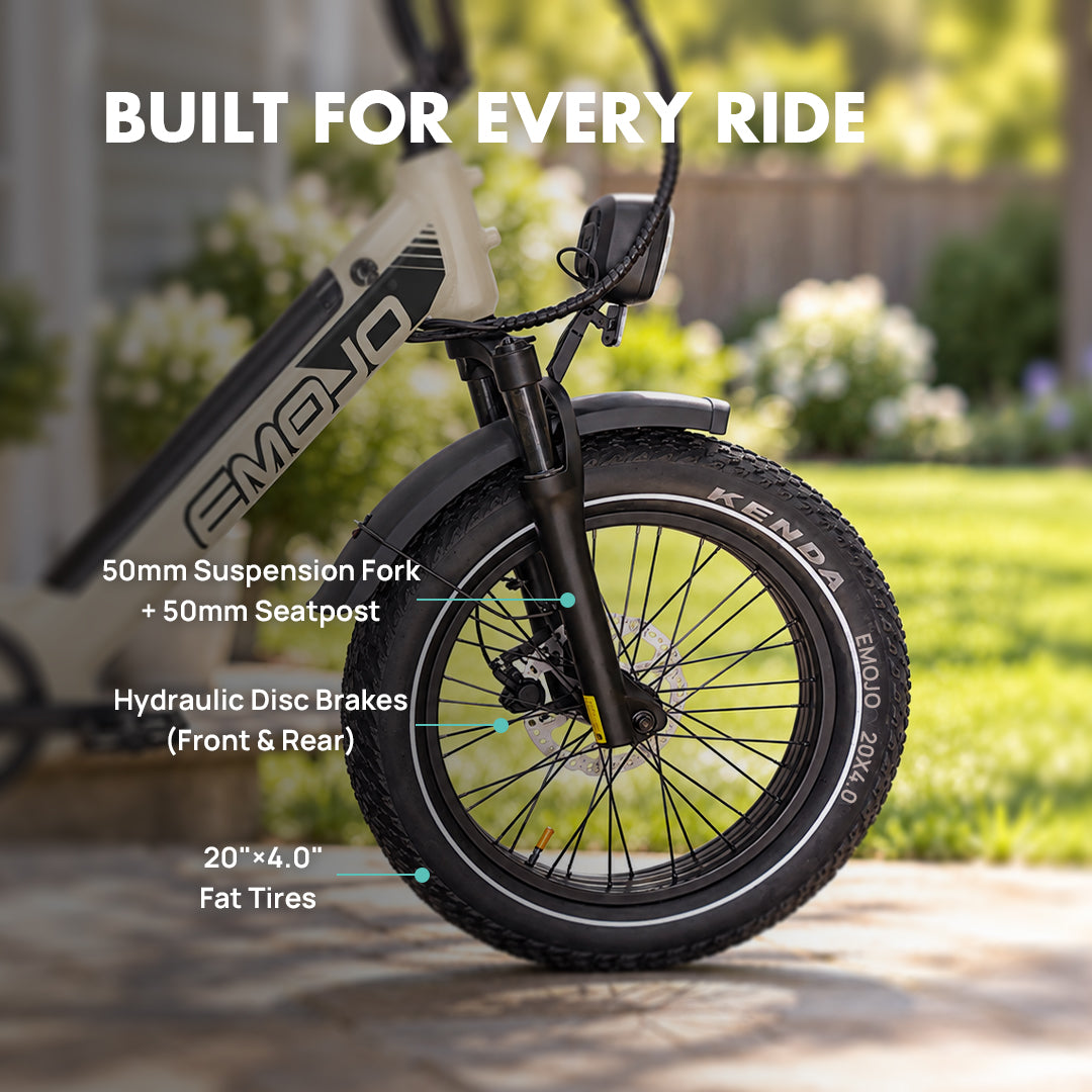 close-up of emojo cargo xplorer fat tire electric bike front suspension fork and hydraulic disc brakes